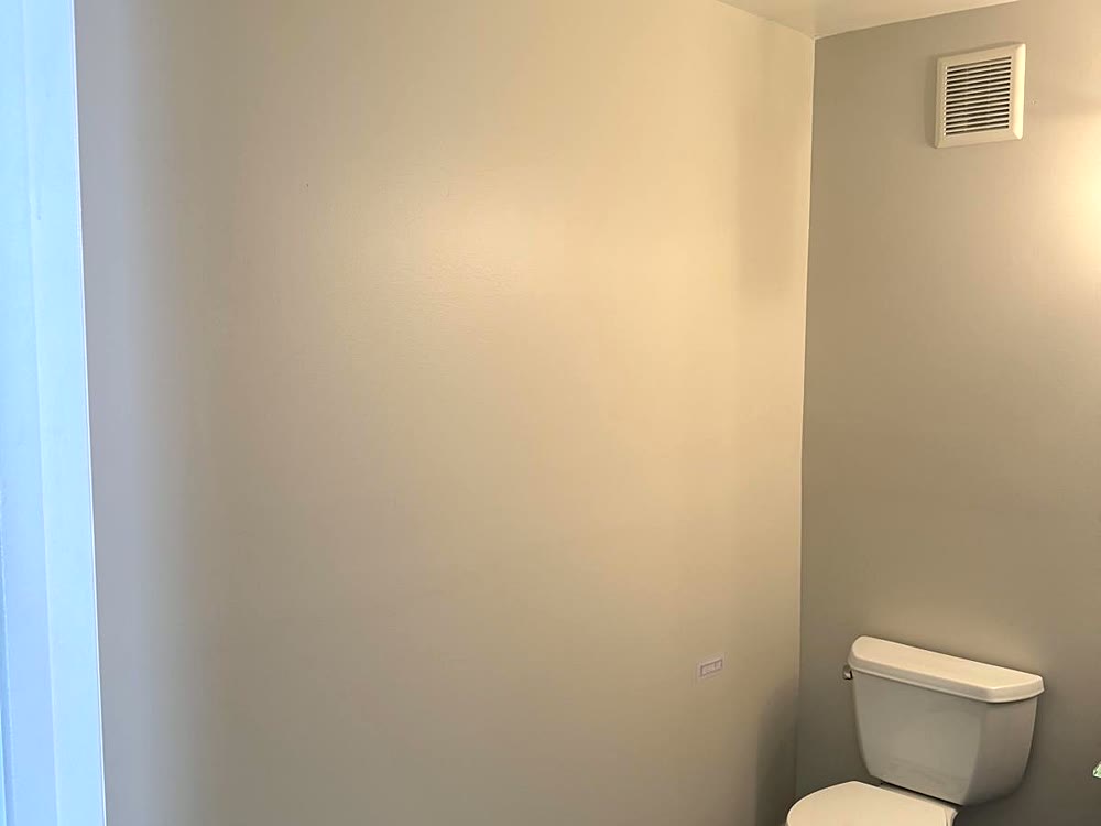 Freshly painted restroom with clean walls