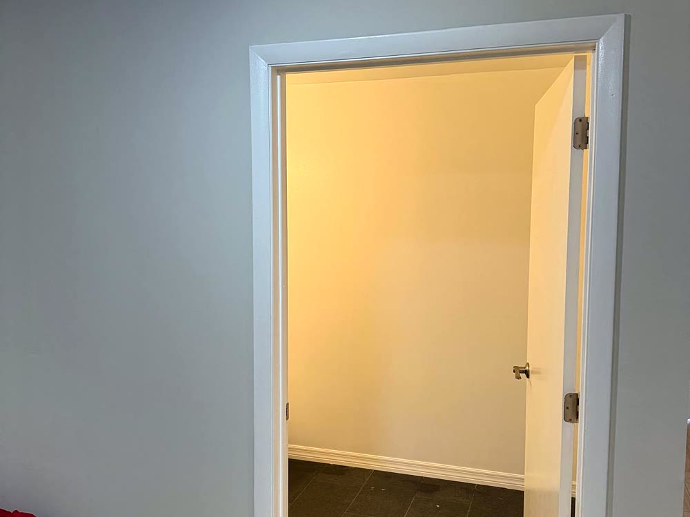 Repainted office interior with painted doorway and trim